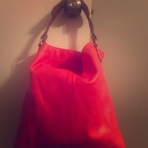 Coral colored shoulder purse